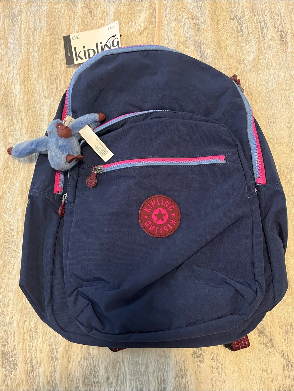 Kipling Navy Backpack with Pink Trim and Monkey Charm